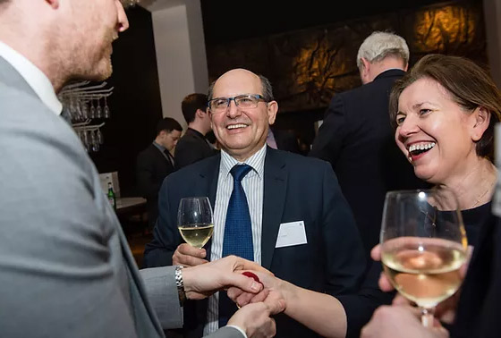 corporate magician at a party